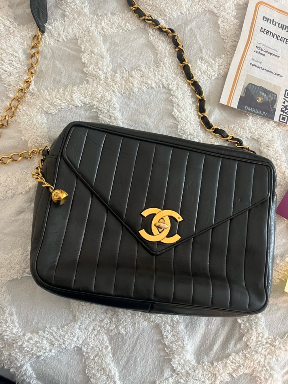 CHANEL Black Quilted Leather Shoulder Bag with Gold CC Emblem